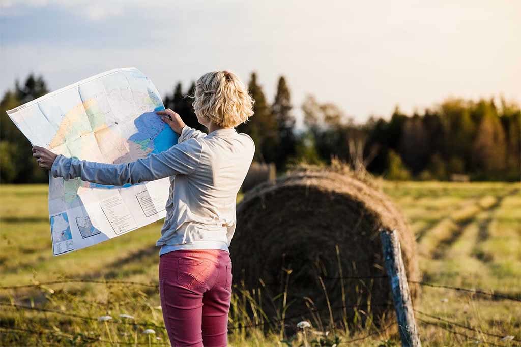 lost woman looking at a map coaching header amatina consulting